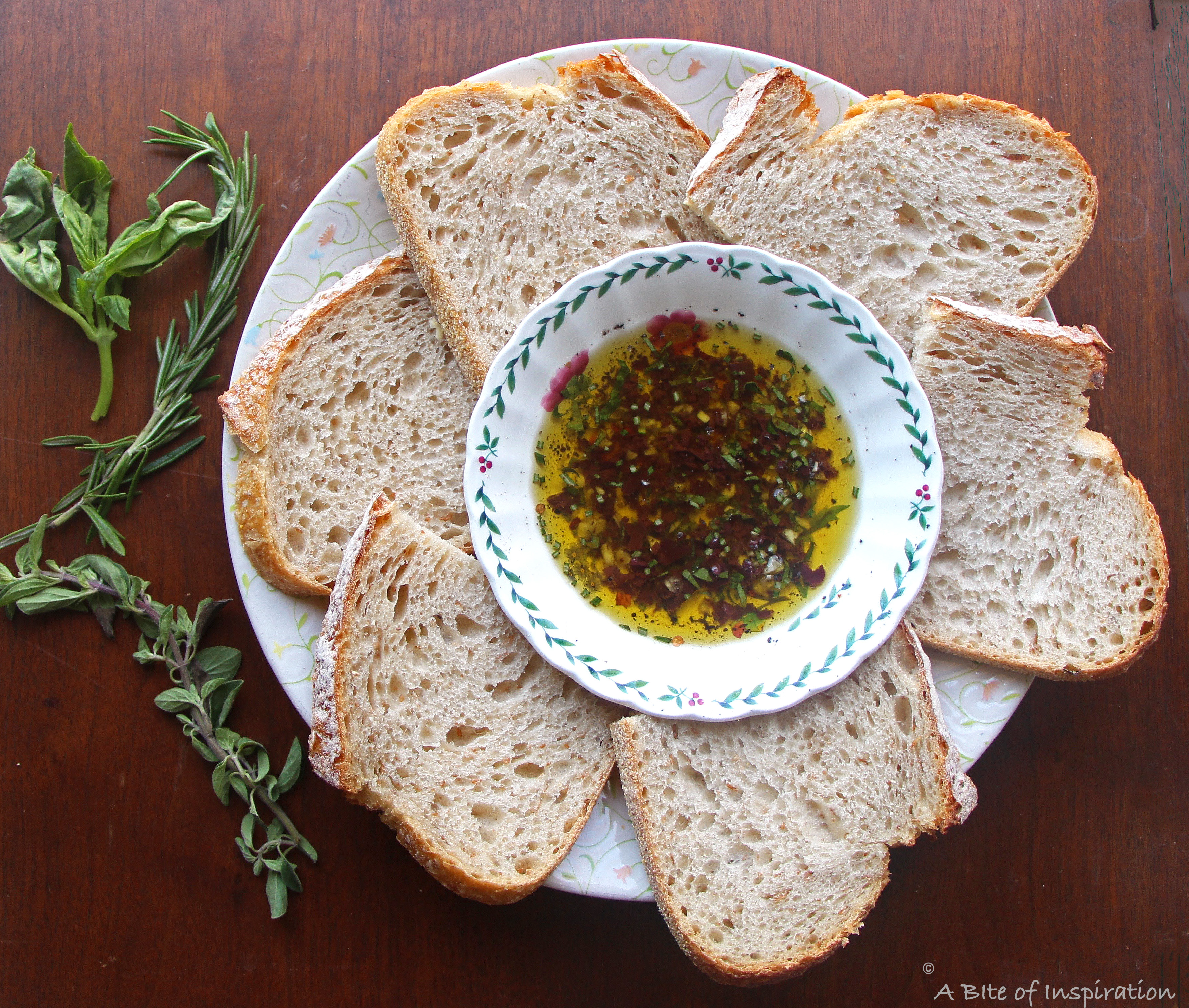 Olive Oil and Fresh Herb Sauce served with bread for dipping